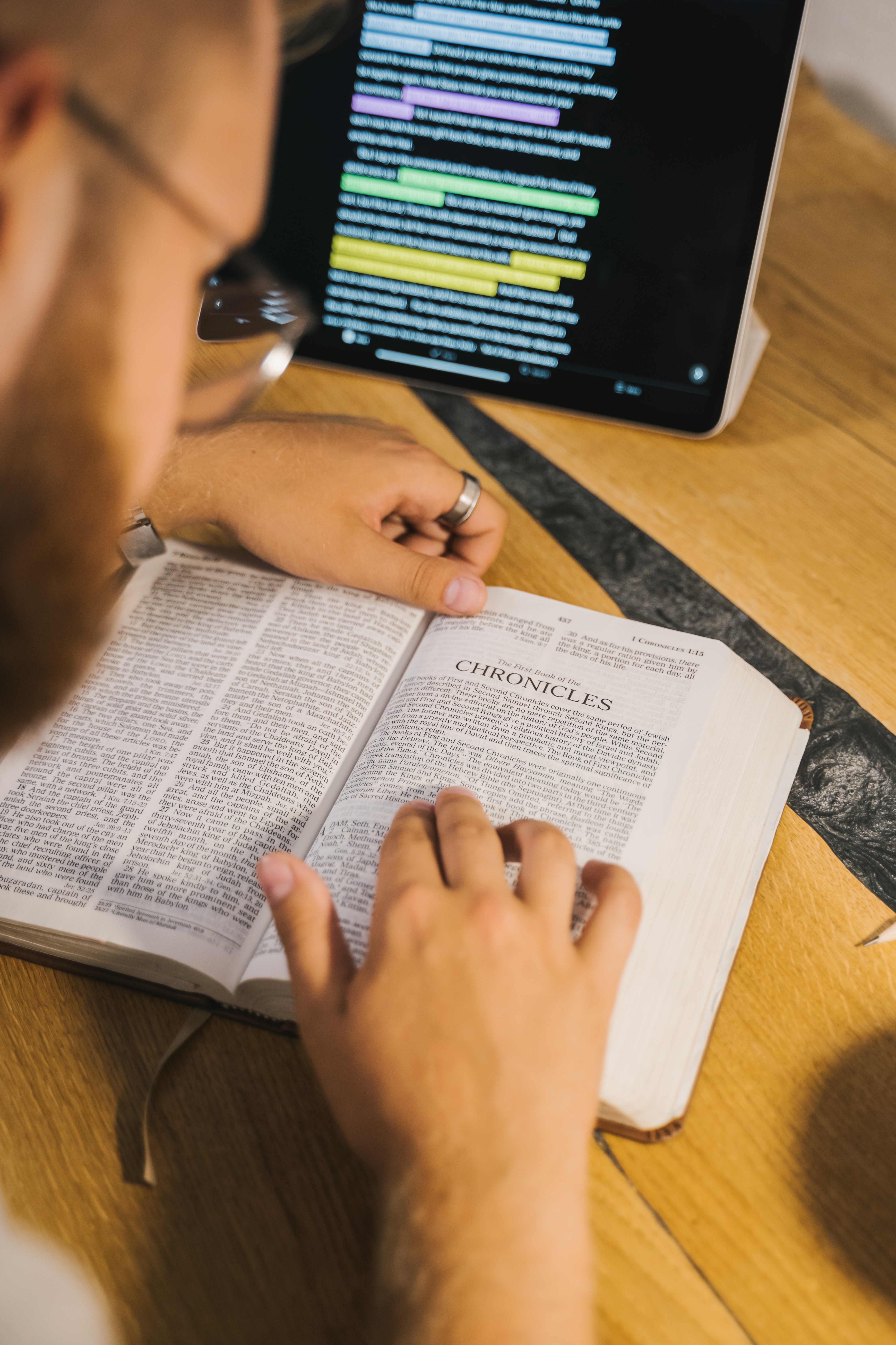 Man reading and studying the bible.