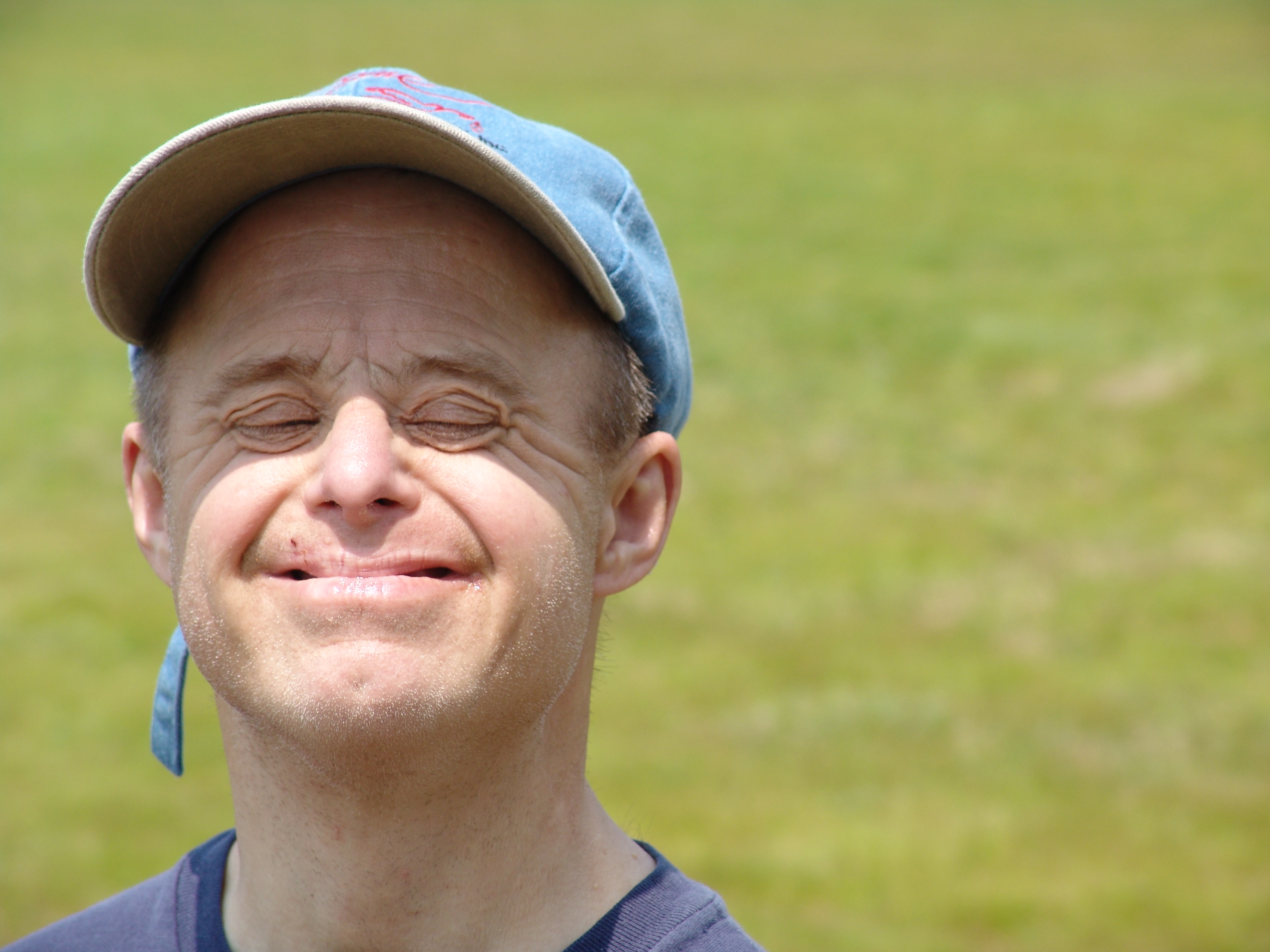 Man outside smiling at the camera